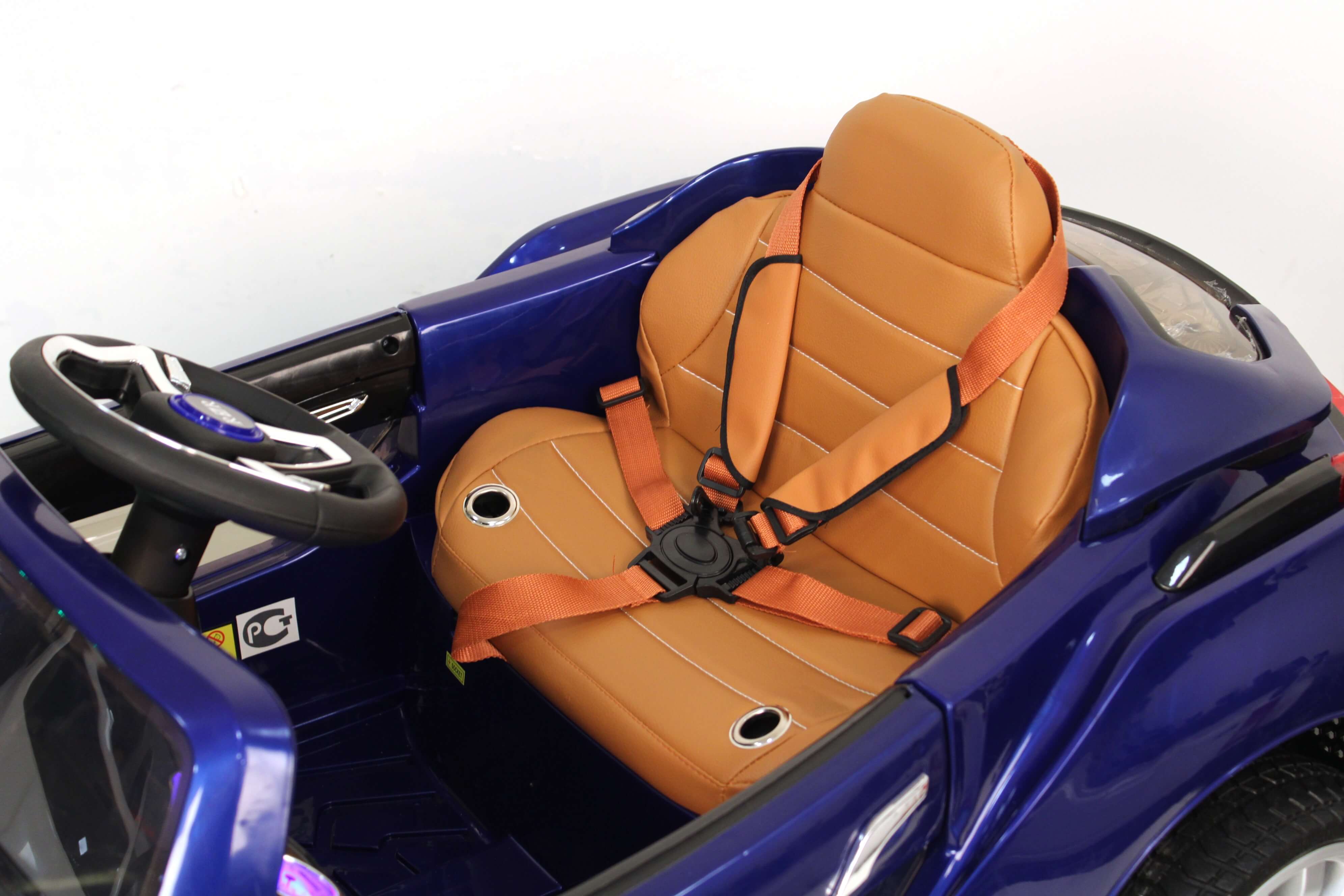 Салон детского электромобиля RiverToys BMW I8 E008KX синего цвета Салон детского электромобиля RiverToys BMW I8 E008KX синего цвета