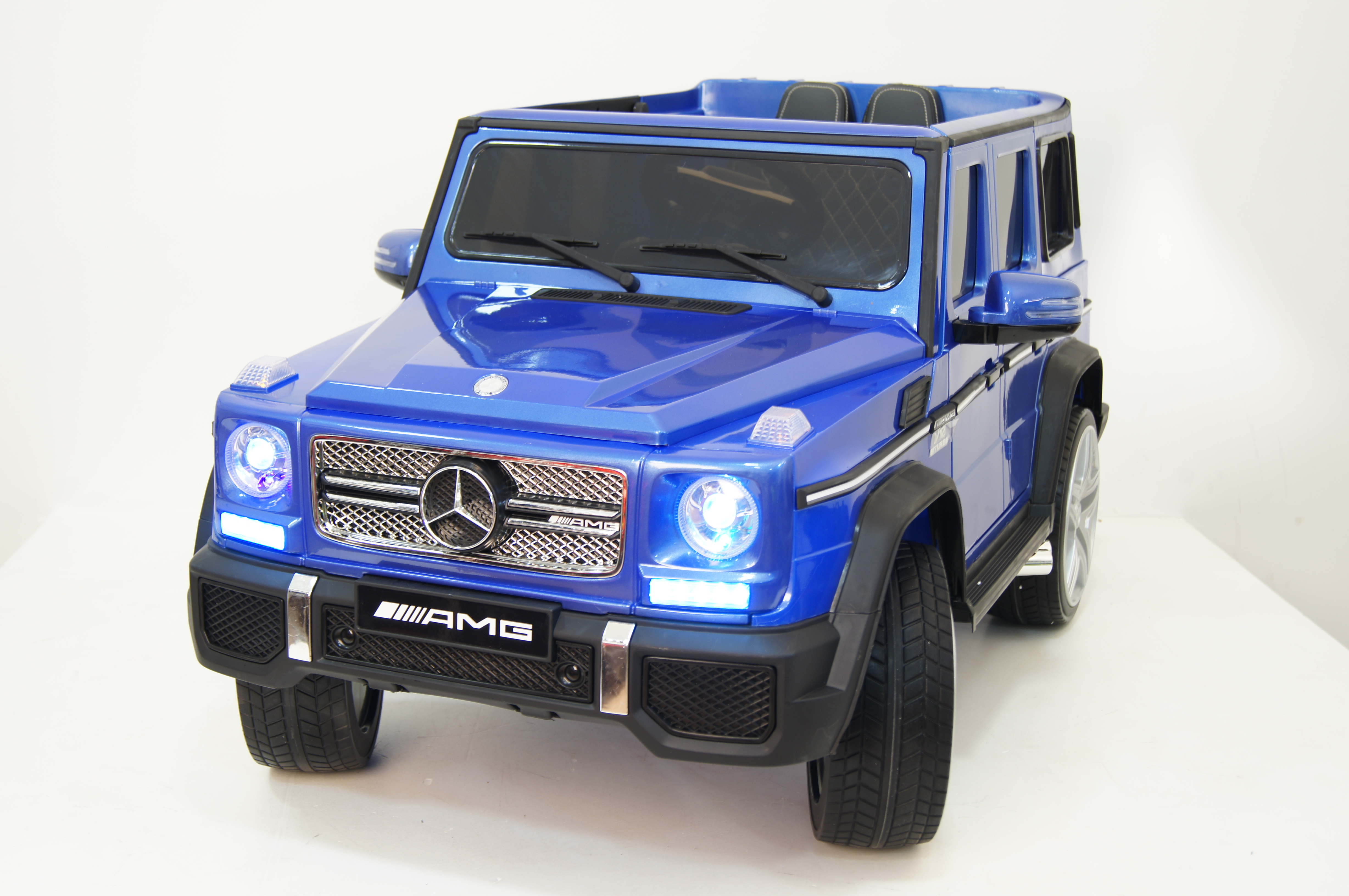 Электромобиль детский RiverToys Mercedes-Benz G65 AMG синий глянец Электромобиль детский RiverToys Mercedes-Benz G65 AMG синий глянец